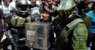 Student Justin Lau, 16, stands proud with Master Chief as he receives his Halo: Reach Legendary Edition